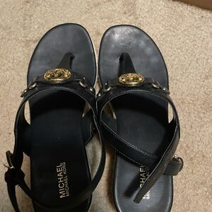 Michael Kors Black Sandals with Gold Emblem
